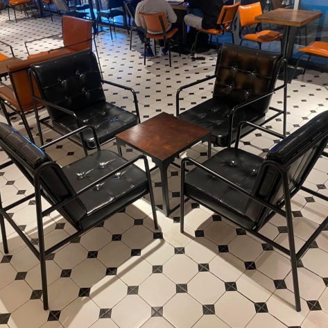 Lợi ích mà bàn cafe chân sắt mặt gỗ mang lại cho quán của bạn