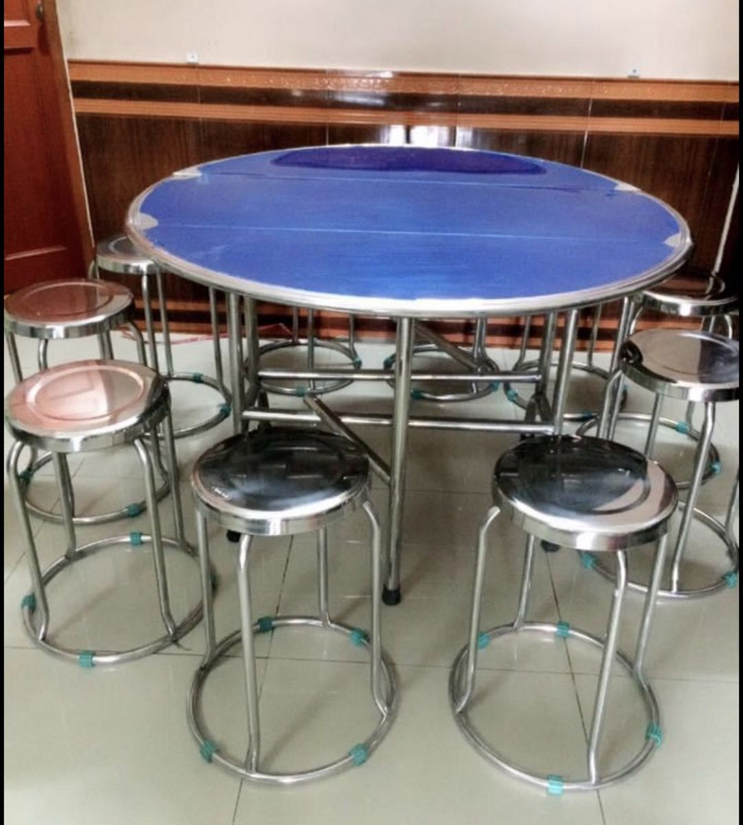 bo-ban-ghe-inox-tron-gia-re